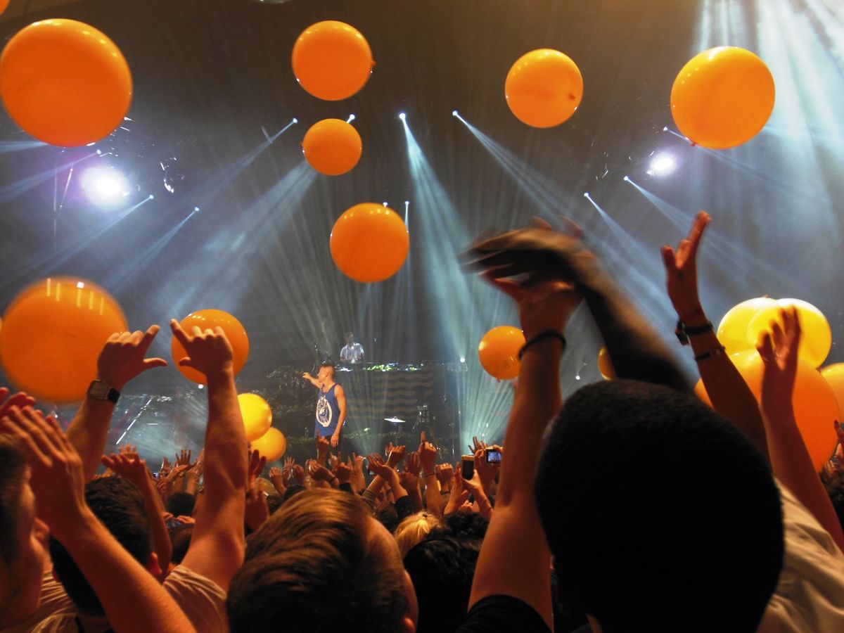 Putting my hands up at a hip-hop concert of Macklemore and Ryan Lewis at the Brixton Academy (London).