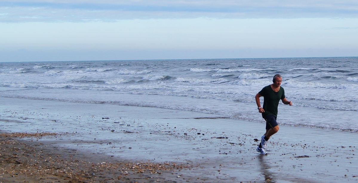 this man was jogging a lone the beach last year