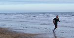 this man was jogging a lone the beach last year