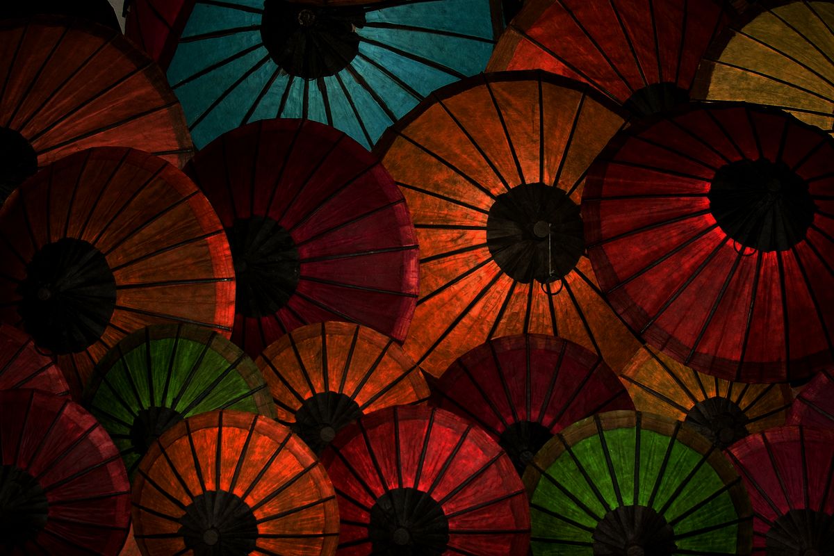 Photo taken without flash, at night. Just backlit from candles at the back of the umbrellas